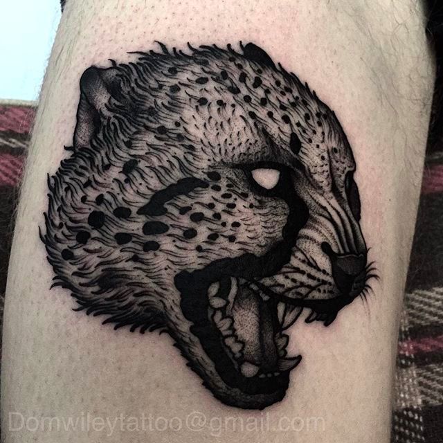 realistic cheetah tattoo