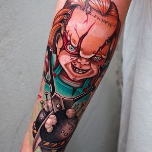 Gruesome tattoo of Chuckie from Child's Play! Awesome work by Camoz. #camoz #coloredtattoo