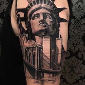 Statue of Liberty and Brooklyn Bridge tattoo by Rods Jimenez. #halfsleeve #blackandgrey #realism #statueofliberty #brooklynbridge #RodsJimenez
