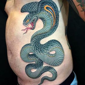Another massive and superb cobra tattoo done by Graham Beech. #GrahamBeech #NeoTraditional #AnimalTattoos #cobra #snake #sidetattoo