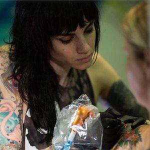 Artist Katie Shocrylas at work by Roly Diaz (via IG-kshocs) #colorful #neotraditional #rainbow #artist #tattooartist #KatieShocrylas