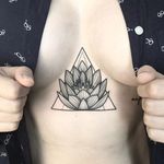 Dotwork lotus sternum tattoo by Klaudia Holda. #dotwork #blackwork #KlaudiaHolda #sternum #lotus #flower