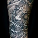 Tibetan skull by Mike Rubendall #MikeRubendall #blackandgrey #Japanese #tibetanskull #Tibetan #skull #death #teeth #filigree #metal #smoke #ornamental #tattoooftheday
