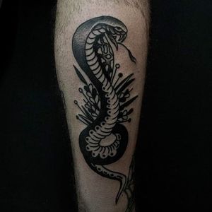 Cobra tattoo, solid work by Levi Rivoire. #levirivoire #traditional #blacktattoos #cobra #cobratattoo