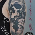 Cool and creepy skull tattoo. Tattoo by Gorsky Tattoos. #DamianGorski #GorskyTattoos #colorrealism #realism #hyperrealism #skull #blackandgrey #balloons #child