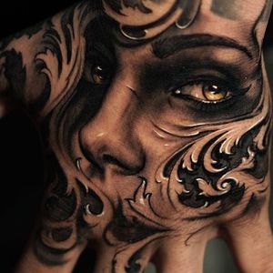 Woman's face and filigree hand tattoo by James Strickland. #realism #blackandgrey #JamesStrickland #woman #face #womansface #filigree #handtattoo