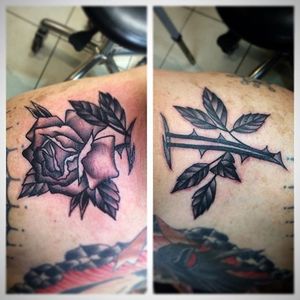 Black and grey rose through the neck by Nick Rutherford. #traditional #NickRutherford #tattooflash #skinrip #rose #flower #blackandgrey