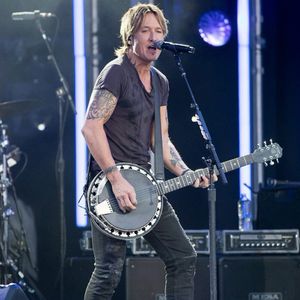 Keith Urban showing off his tattoos at his concert. #KeithUrban #CountryMusic #Country