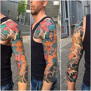 Traditional Japanese sleeve featuring a foo dog and peony. By Joel Ang. #foodog #peony #flower #Japanese #traditionaljapanese #JoelAng
