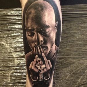 Tupac Shakur tattoo by Ash Lewis. #2pac #TupacShakur #rapper #portrait #blackandgrey
