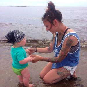 @roxanneroy and her little man at the beach. #tattoodomoms #tattoogoals #tattoodobabes #beachday