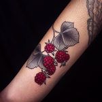 A beautiful combination of the red and black and grey. Great tattoo by Alexander Masom. #AlexanderMasom #berries #blackandred #organic