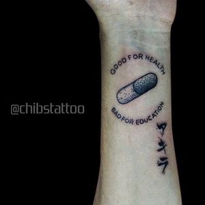 Good for health, bad for eduction. Tattto by Geek & Cute Ink #Geek&CuteInk #pilltattoo #pill #quote #blackwork