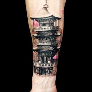 Gorgeous tattoo of an oriental pagoda. Tattoo by Steve Toth. #SteveToth #BritishTattooer #blackandgrey #realism #hyperrealism #MonumentalInk #pagoda #oriental