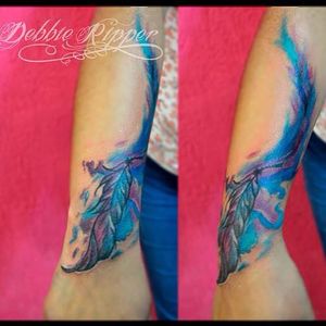 Blue and purple watercolor feather tattoo by Debbie Ripper. #watercolor #DebbieRipper #feather