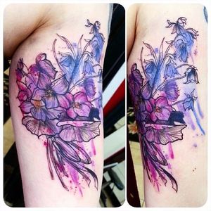 Abstract watercolor bluebells and violets tattoo by Joanne Baker. #violet #flower #purple #bluebells #botanical #JoanneBaker