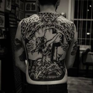 Jaw dropping Rock of Ages back piece done by Rich Hardy. #RichHardy #blackwork #traditionaltattoos #classictattoos  #americana #rockofages