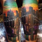 Brooklyn Bridge and New York skyline tattoo by Dennis Mackie. #color #skyline #styledrealism #brooklyn #brooklynbridge #DennisMackie