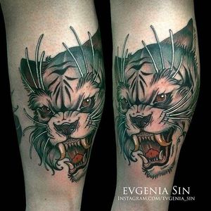 Solid and clean bobcat head tattoo by Evgenia Sin. #EvgeniaSin #neotraditional #coloredtattoo #bobcat #bobcathead