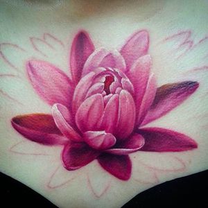 Vibrant looking lotus in the works. Tattoo by Tatyana Kashtan. #TatyanaKashtan #lotus #coloredtattoo