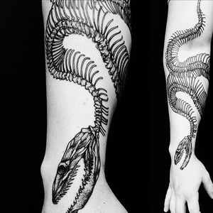 Blackwork skeletal snake tattoo by Casper Mugridge. #CasperMugridge #blackwork #snake #skeleton