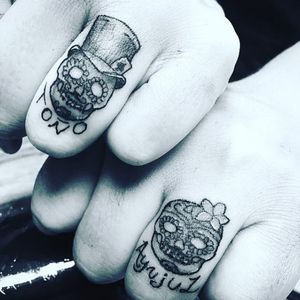 Matching skull tattoos by Brooks via Instagram @paubrooks #matchingtattoos #matchingtattoo #sugarskull #sugarskulltattoo #skull #skulltattoo #Brooks #relationshipgoals #lettering