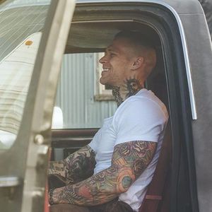 Such a natural smile in this shot Photo by The 8th Class #MarshallPerrin #tattoomodel #tattooedguys #firefighter #traditionaltattoo #tattoododudes #The8thClass