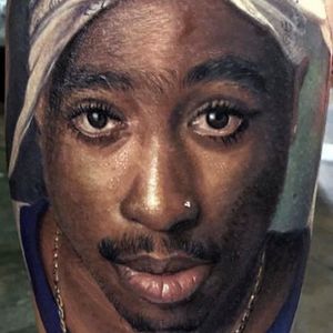 Tupac tattoo by Deley Tattoo #Deleytattoo #colortattoo #Tupactattoo #rappertattoo #musictattoos #realismtattoo #realistictattoo #hyperrealismtattoo #portraittattoo #eyetattoo #lipstattoo #tattoooftheday