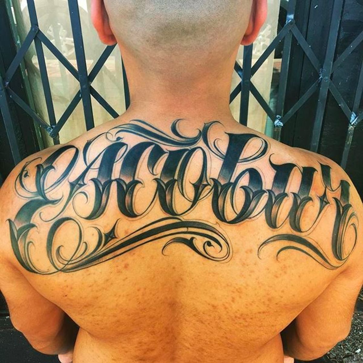 Tattoo uploaded by minerva • Escobar Lettering Tattoo by Orks One via ...