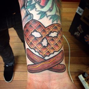 A waffle and hot dog version of a skull and crossbones. Tattoo by Morten Overlie. #newschool #waffle #hotdog #MortenOverlie