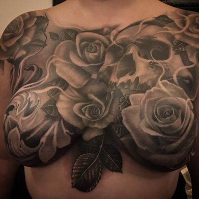Mastectomy tattoo by Gabriel Londis #GabrielLondis #CoverUpTattoos #mastectomytattoo #scarcoverup #blackandgrey #realism #realistic #hyperrealism #rose #smoke #skull #fleurdelis #leaves #nature #tattoooftheday