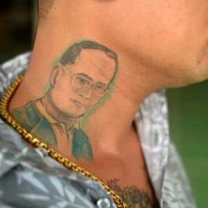The king's beloved father, King Bhumibol Adulyade, in neck tattoo form. #necktattoo #BhumibolAdulyade #thailand