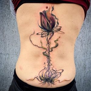 Swirly abstract tulip tattoo by Sara Liverani. #flower #tulip #abstract #SaraLiverani
