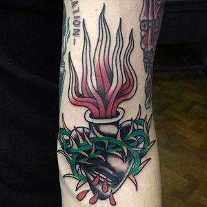 Black Sacred Heart tattoo, solid work by Tattoo Rom. #TattooRom #sacredheart #traditional