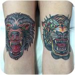 Wolf & Tiger heads by Chris Stuart. (Instagram: @chrisxempire) #traditional #wolf #tiger #animalhead #knee #ChrisStuart