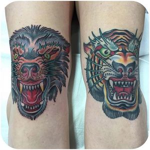 Wolf & Tiger heads by Chris Stuart. (Instagram: @chrisxempire) #traditional #wolf #tiger #animalhead #knee #ChrisStuart