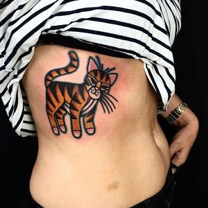 This one by Dani Queipo reminds me of The Lion King. #bold #cats #cattoos #DaniQueipo #traditional #tiger