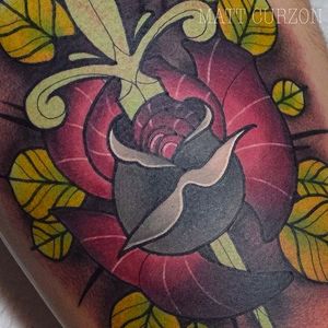 Detail shot of a dagger and rose tattoo by Matt Curzon. #mattcurzon #dagger #rose #neotraditional #flower