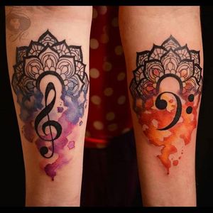 Musical watercolor mandalas by Nancy Tattooer. #watercolor #NancyTattooer #music #musicnotes #trebleclef #bassclef #mandala