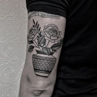 Potted rose tattoo by Justin Olivier #JustinOliver #planttattoos #blackwork #linework #dotwork #rose #rosebuds #leaves #flowers #floral #pattern #vase #ornamental #tattoooftheday