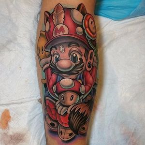 Super Mario World tattoo by Adam Aguas. #supermario #videogame #AdamAguas