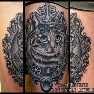 Beautiful black and grey work on this steampunk kitty tattoo by Jesse Pinette at Precision tattoo #steampunk #victorian #scifi #vintage #futuristic #cat #blackandgrey #JessePinette #PrecisionTattoo