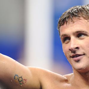 Olympic Swimmer Ryan Lochte's Tattoo #OlympicTattoos #OlympicRingTattoos #OlympicRings #SportsTattoo #AthleteTattoos