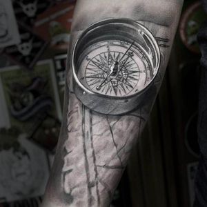 Solid looking compass tattoo done by Anastasia Forman. #AnastasiaForman #realistic #blackandgray #compass