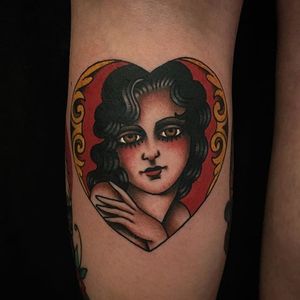 Javier Betancourt's (IG—javierbetancourt) colorful take on the lady head bordered by an embellished heart.  #heart #JavierBetancourt #ladyhead #traditional