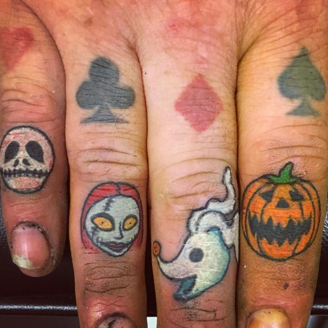 Halloween finger tatts  Hand and finger tattoos Finger tattoo designs  Knuckle tattoos