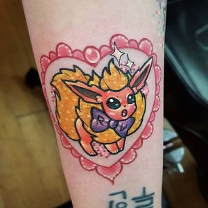 Flareon tattoo by Mewo Llama. #MewoLlama #pokemon #videogames #anime #kawaii #cute #eevee #fire #heart