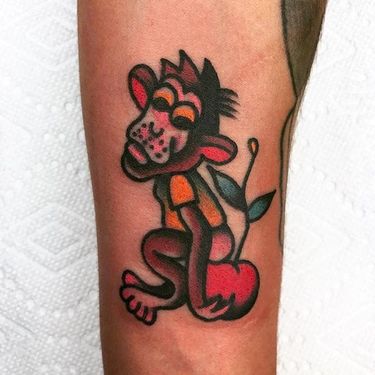 Solid and cute little monkey sitting on an apple. Tattoo by Jason Ochoa. #JasonOchoa #GreenPointTattooCo #traditionaltattoo #boldtattoos #monkey #apple