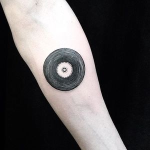 Vinyl tattoo by Emily Alice Johnston. #vinyl #record #blackwork #EmilyAliceJohnston #simple #blackwork