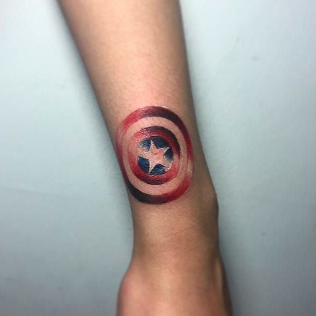 Small Captain America Shield In Skin 3d Mens Collar Bone Tattoo  Captain  america tattoo Tattoo designs men Marvel tattoos